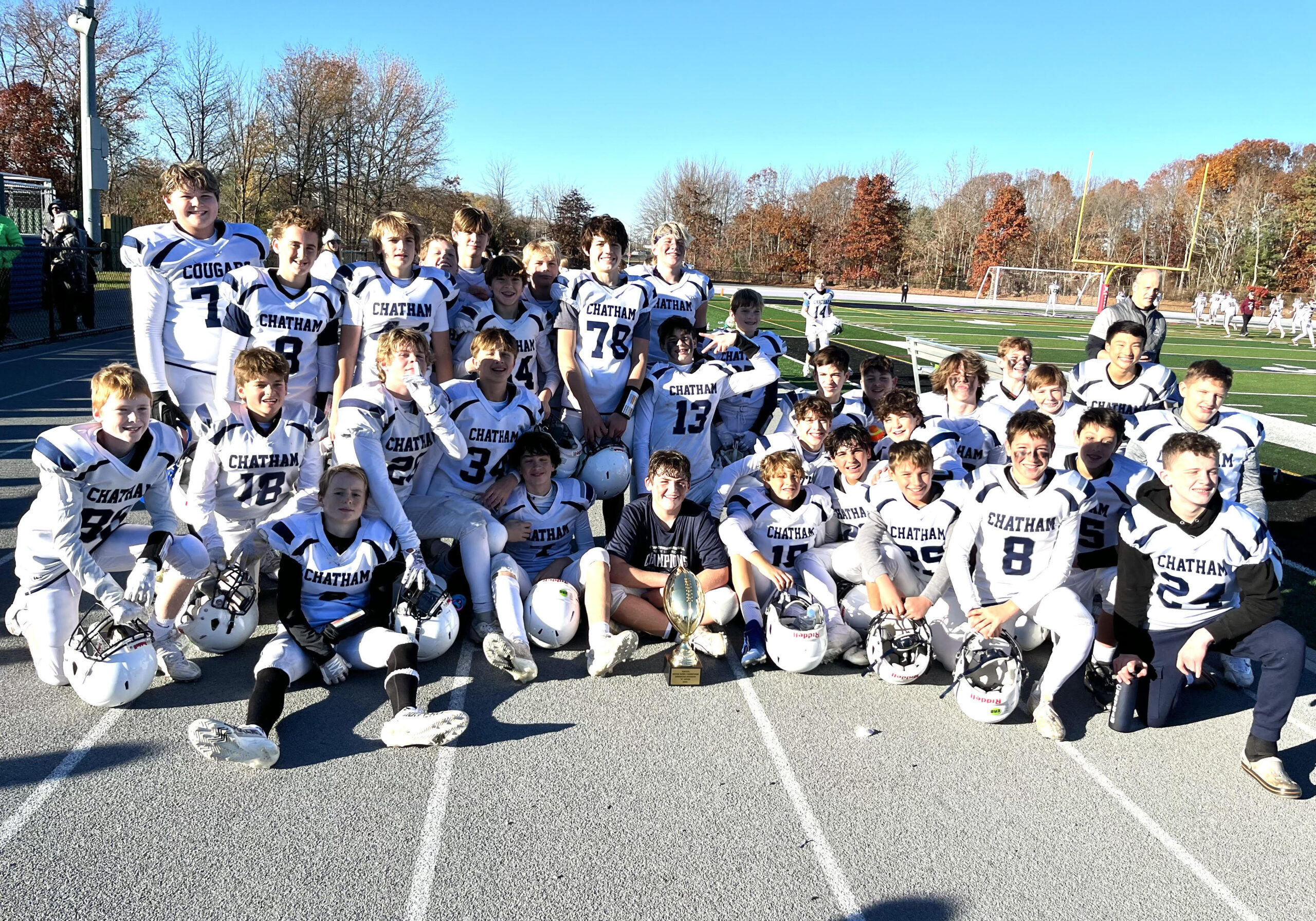 Our tackle players together on the field
